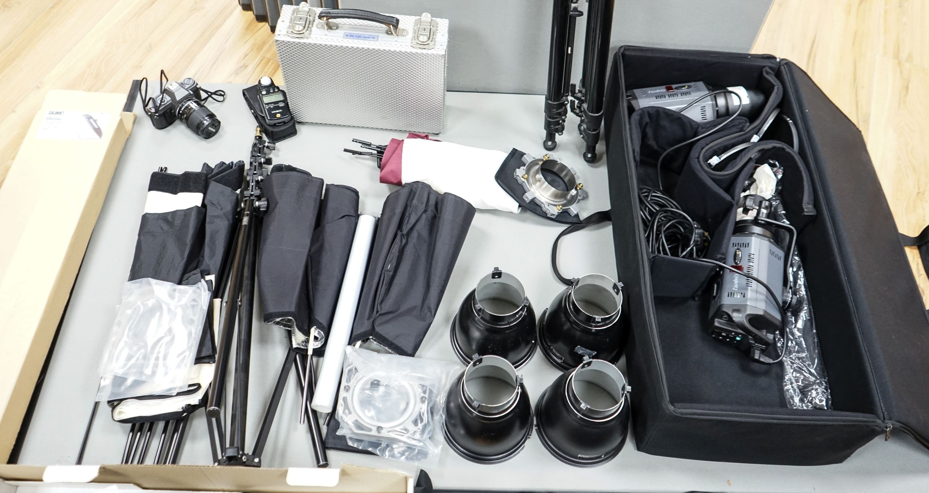 Professional photography equipment including a Pentax P30T SLR camera with Tamron 90mm f/2.5 lens, a pair of Bowens Esprit 1000 lights and a pair of Esprit 500 lights, a pair of Esprit 2 500 lights, various soft boxes, v